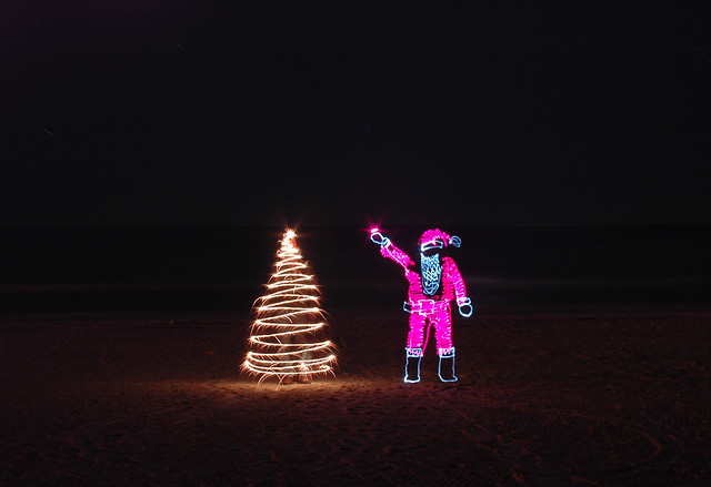 Santa hangs the star
