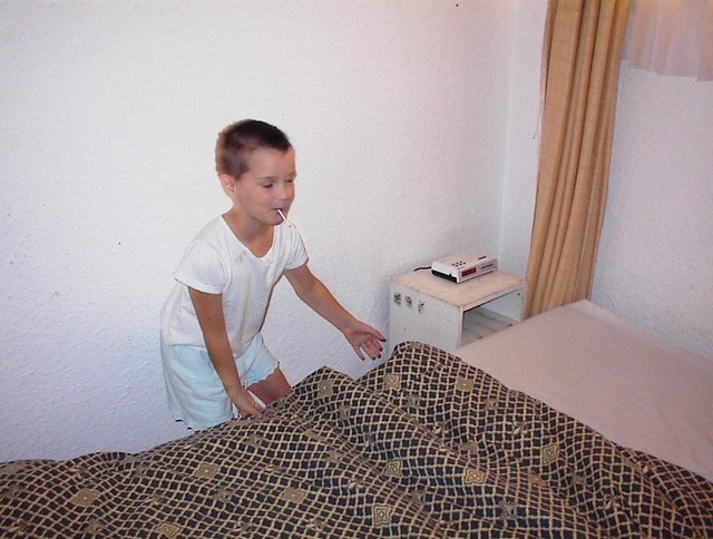 Child Making Bed