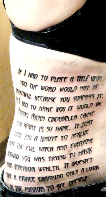 tattoo of a quote down a ladies side tattooed by Cash Parish skintastic 