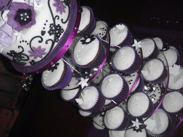 wedding cupcake tower Vanilla yoghurt cupcakes topped with vanilla 