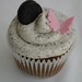 Cookies 'n' cream cupcake with pink butterfly