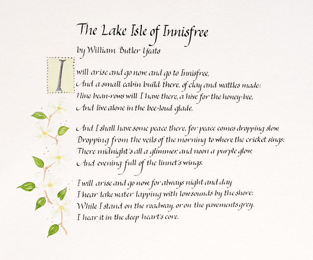 The Lake Isle of Innisfree poem in handwritten italic calligraphy with spring blossom illustration