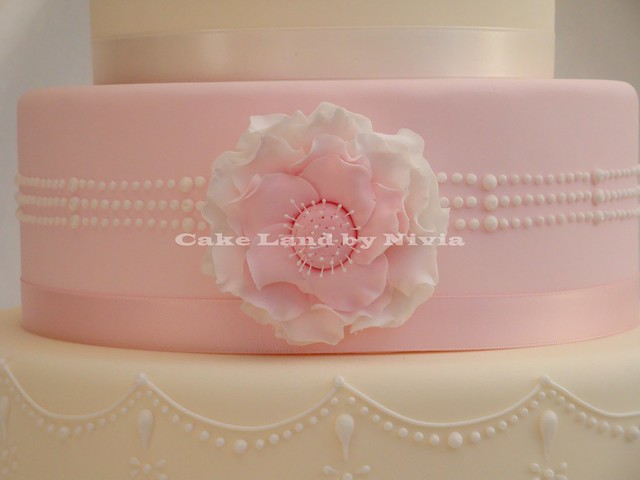 Pink and cream wedding cake