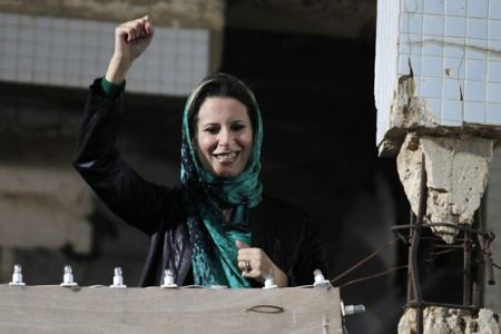 Aisha Gaddafi, the daughter of Libyan leader, Muammar Gaddafi, said that asking her father to leave office and the North African state was an insult to all citizens of the country. She is now being threatened in neighboring Algeria after taking refuge. by Pan-African News Wire File Photos