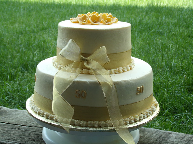 50th Wedding Anniversary cake Golden yellow cake filled with raspberry 