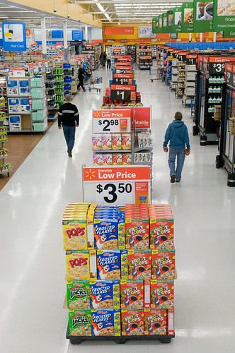 Walmart's "Action Alley" Display Signs Feature Value and Convenience on Popular Shopping Items