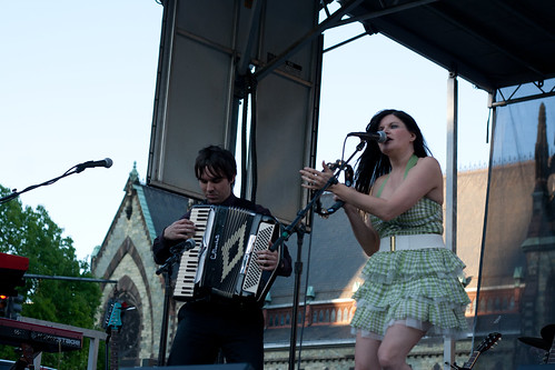 April Smith and Lead Guitarist Playing the Accordian
