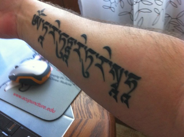 Recent Tattoo Green Tara Mantra in Tibetan