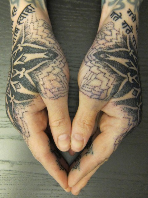 Hand Tattoos by Thomas Hooper