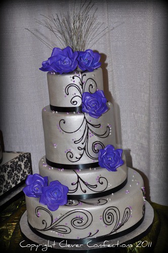 Silver Majesty Wedding Cake This fondant covered cake is sprayed with 