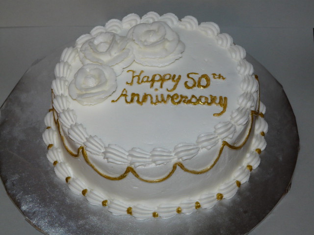50th wedding anniversary cake hand painted gold details