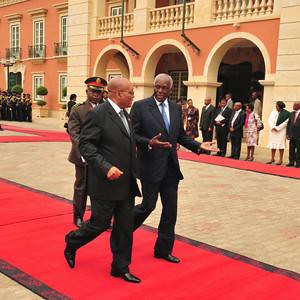 Angolan President Jose Eduardo dos Santos of the Republic of Angola welcomes President Jacob Zuma of the Republic of South Africa during a state visit in 2009. Both southern African states have enhanced relations. by Pan-African News Wire File Photos