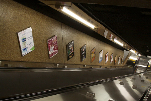 Escalators and advertising at Sheung Wan station