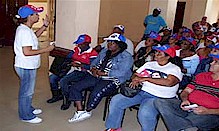 Mayra Villafranca explains the Cuban health mission in Haiti to new personnel arriving in the fellow African-Caribbean nation. Haiti suffered an earthquake of Jan. 12, 2010 and was hit by a cholera epidemic in Nov. by Pan-African News Wire File Photos