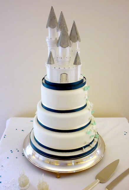 Teal and diamante castle wedding cake Well I've finally lost my'stacked