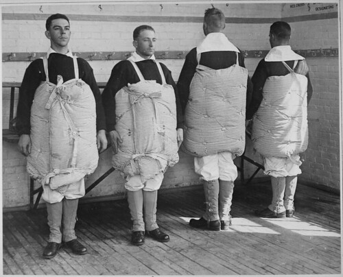 ecruits with their mattresses tied to them to serve as life preservers. by The U.S. National Archives