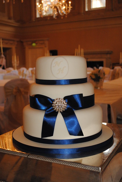Ivory and Navy Wedding Cake A 3 tiered wedding cake