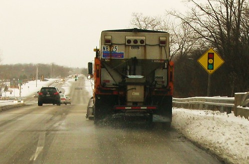 Illinois Department Of Transportation International dump truck plowing snow and spreading rock salt. Glenview Illinois USA. Tuesday, February 1st, 2011. by Eddie from Chicago