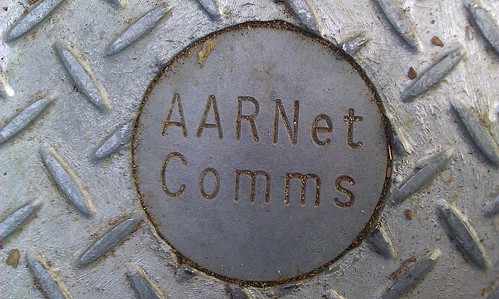 AARNet manhole cover - near 165 Miller St North Sydney