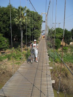 biking on suspension bridge