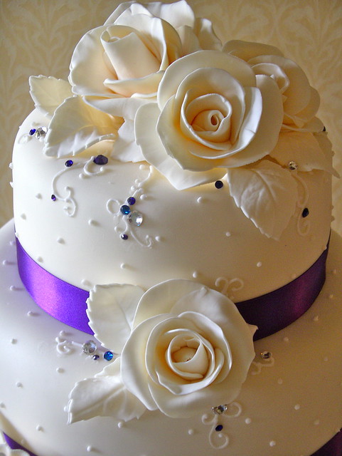 Ivory purple rose wedding cake