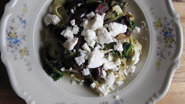 Fresh pasta with olives, spinach, and feta