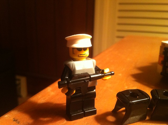 Lego Swat Captain You can see he is the captain because he has a silver 