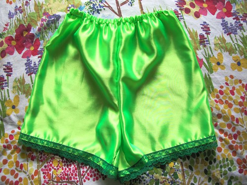 neon green pettipants on bed