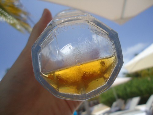 A glass of beer on the beach