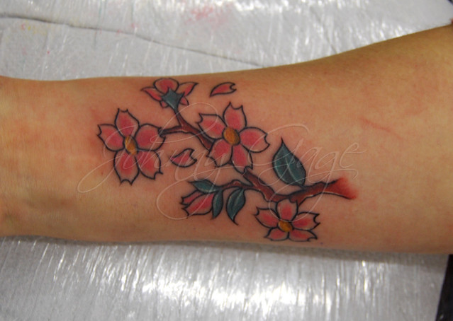 cherry blossom branch tattoo Tattooed by Johnny at The Tattoo Studio