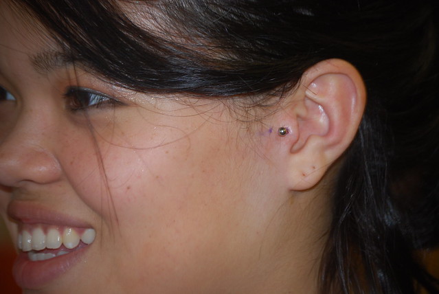 Tragus ear piercing done by