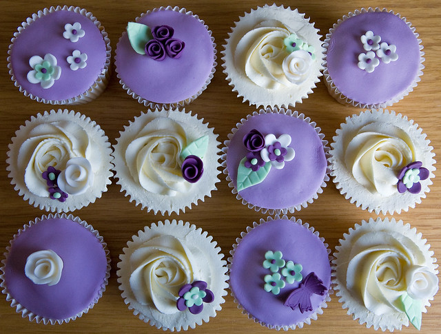 Purple wedding cupcakes Wedding designs in purple and cream