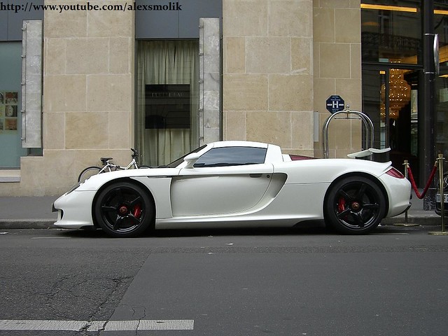 Cruising in Paris I saw this white Porsche Carrera GT with black rims and