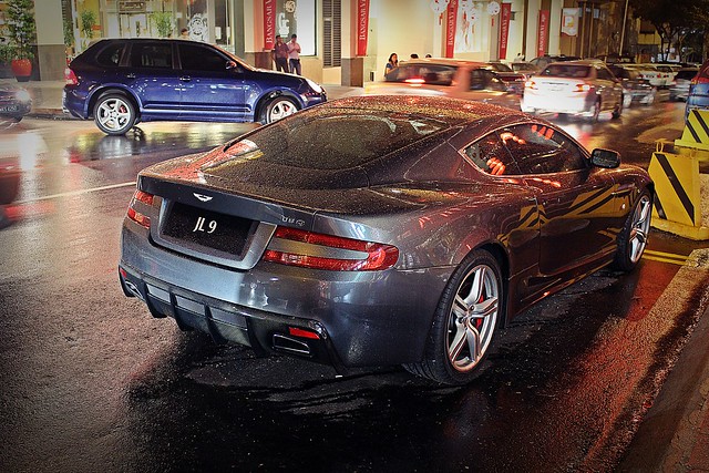Aston Martin DB9 Mansory just parked right there in the rain beautiful