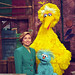 Photograph of First Lady Hillary Rodham Clinton Posing on the Big Bird Nest Set with Big Bird...