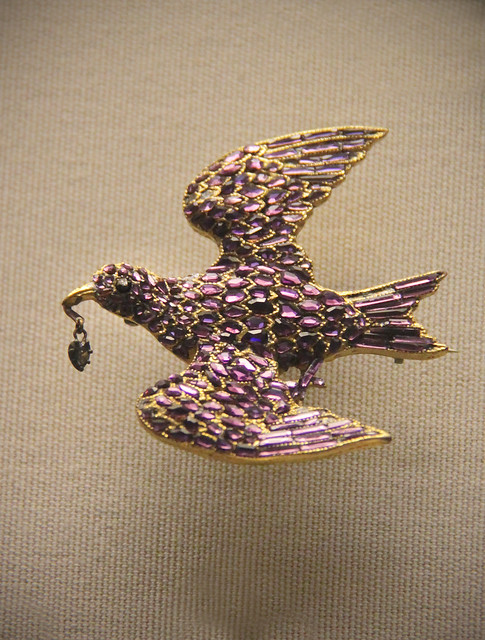 Bird brooch, gilt-metal set with purple Bohemian glass chips