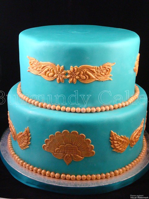 Teal and silver wedding cakes