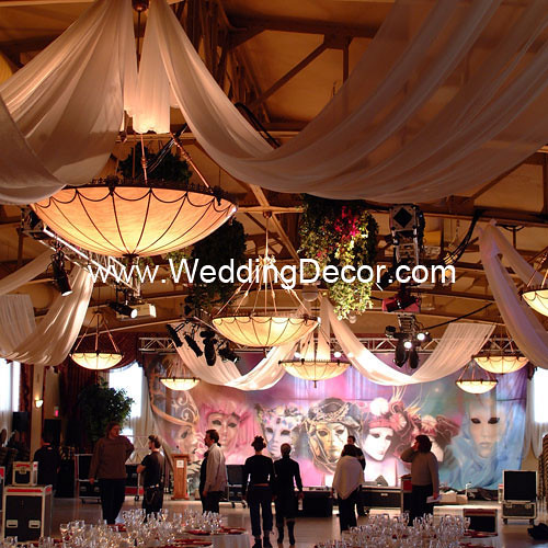 A multi panel ceiling canopy in ivory To see additional wedding decor 