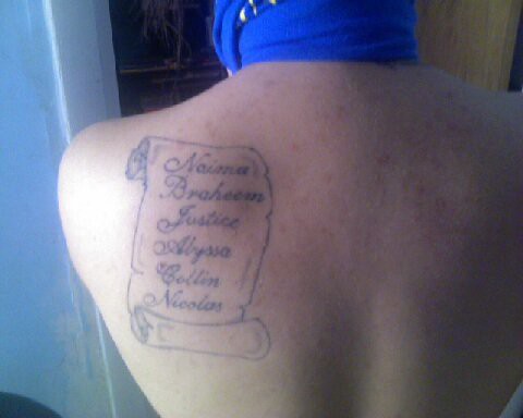 My scroll tattoo of my childrens names