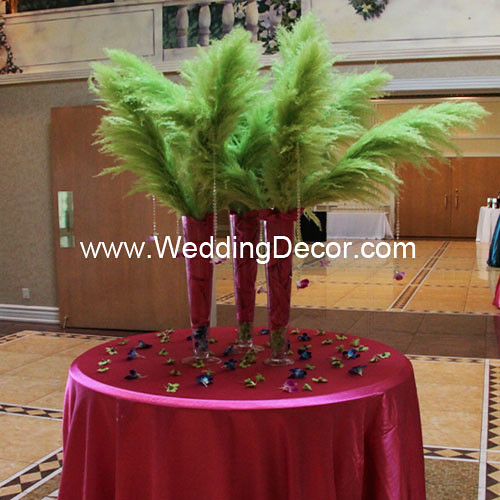  Masquerade wedding themed reception with green feather arrangements in 