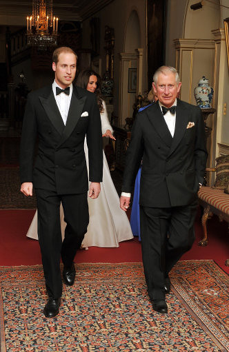 Evening wedding reception The Prince of Wales walks with The Duke of 