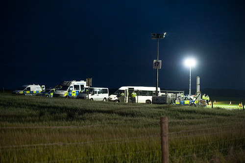 cops in a field at night by mdx