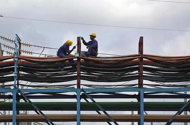 Workers maintain the thermal power station at Takoradi, Ghana