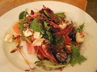 Red chicory, goat's cheese and blood orange salad with hazelnut dressing