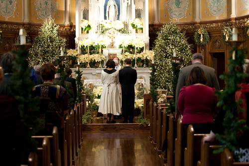 Bride and groom at altar Photo by James Reyes Photography