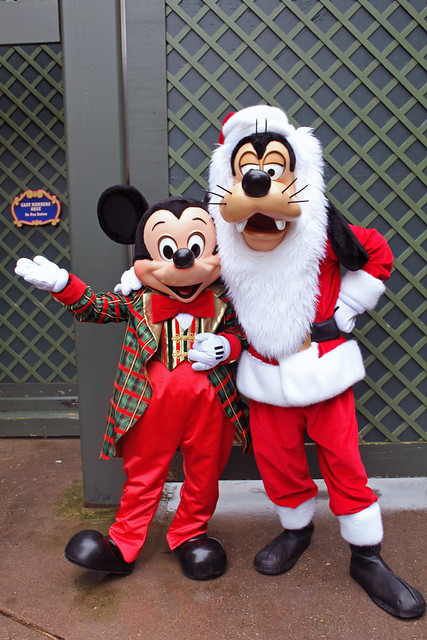 Mickey and Goofy in their Christmas best