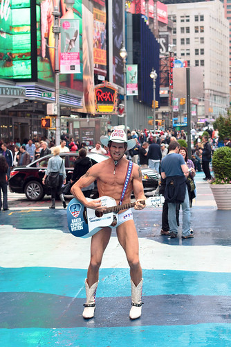 Naked Cowboy Still Singing in Times Square (With Face Mask 