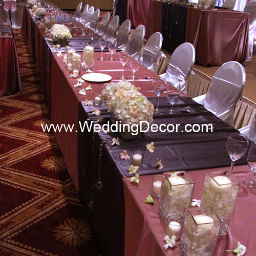Head table decorations for a wedding reception in dusty rose and charcoal 