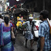Rickshaw puller in a small street