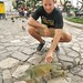 justin touching the iguana